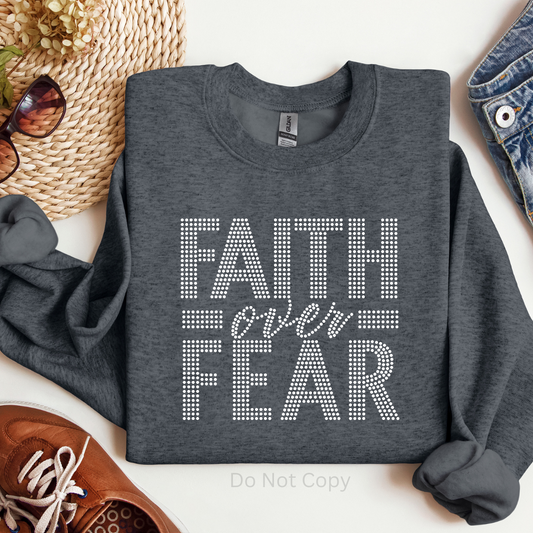 Faith Over Fear Silver Rhinestone Transfer on a tshirt