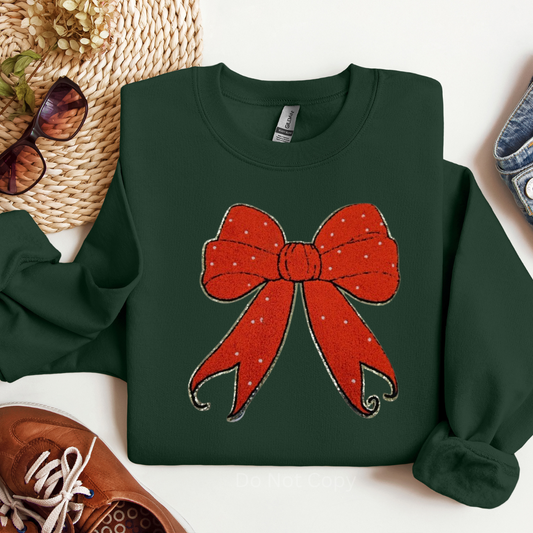 Red Holiday Bow Chenille Patch on a tshirt